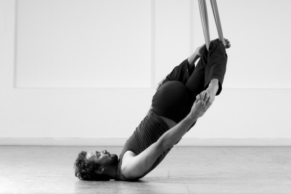 Leg in Elevated Twist aerial yoga Lucas